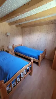 Ein Bett oder Betten in einem Zimmer der Unterkunft Chalet Bergtraum