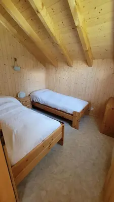 Ein Bett oder Betten in einem Zimmer der Unterkunft Chalet Bergtraum