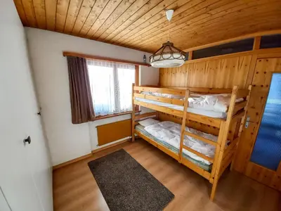 Ein Bett oder Betten in einem Zimmer der Unterkunft Apartment Essert 101 by Interhome