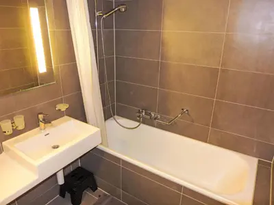 Ein Badezimmer in der Unterkunft Studio Golf Bellerive 76 by Interhome