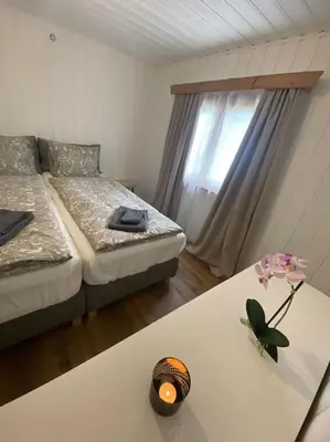 Ein Bett oder Betten in einem Zimmer der Unterkunft Cozy 2-Bedroom Bungalow