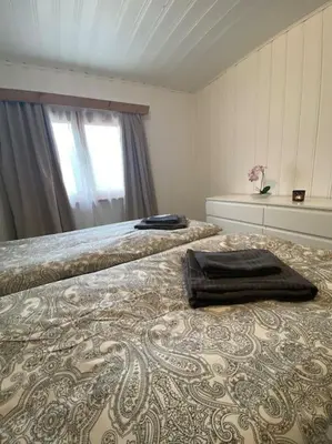 Ein Bett oder Betten in einem Zimmer der Unterkunft Cozy 2-Bedroom Bungalow