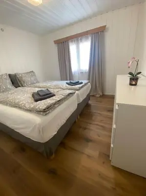 Ein Bett oder Betten in einem Zimmer der Unterkunft Cozy 2-Bedroom Bungalow