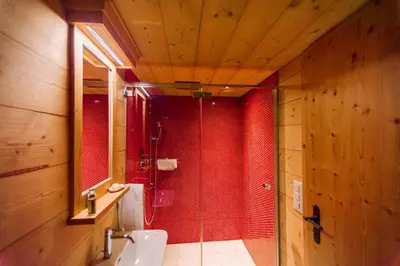 Ein Badezimmer in der Unterkunft Chalet Caramelle