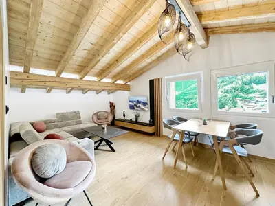 Ein Sitzbereich in der Unterkunft Dynastic Penthouse - 4 Valleys - Swiss Alps