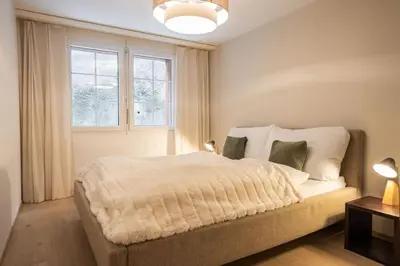 Ein Bett oder Betten in einem Zimmer der Unterkunft Aquila Apartment by Homeflow