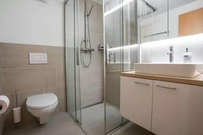 Ein Badezimmer in der Unterkunft Aquila Apartment by Homeflow