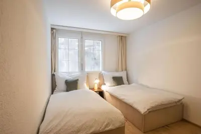 Ein Bett oder Betten in einem Zimmer der Unterkunft Aquila Apartment by Homeflow