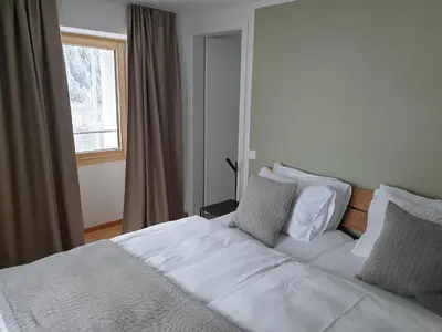 Ein Bett oder Betten in einem Zimmer der Unterkunft Osteria Bäkar