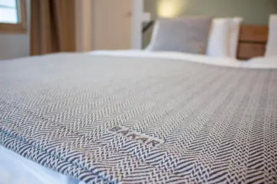 Ein Bett oder Betten in einem Zimmer der Unterkunft Osteria Bäkar