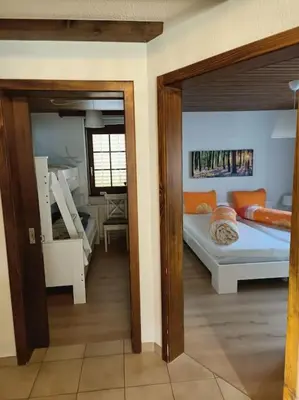 Ein Bett oder Betten in einem Zimmer der Unterkunft Ferienwohnung im Haus Castor