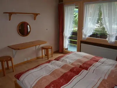 Ein Bett oder Betten in einem Zimmer der Unterkunft Apartment Mösli - Zimmerli by Interhome