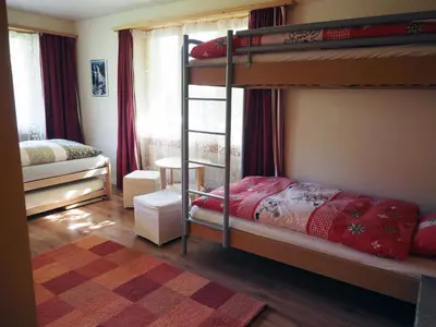 Ein Bett oder Betten in einem Zimmer der Unterkunft Apartment Am Ryschbächli by Interhome