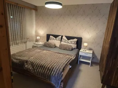 Ein Bett oder Betten in einem Zimmer der Unterkunft Apartment Gletscherhorn II - Tapia by Interhome