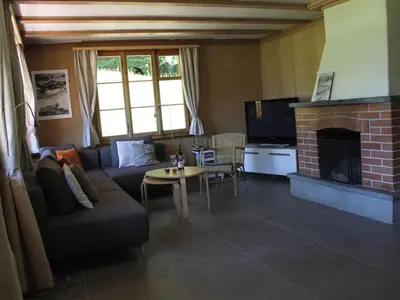 Ein Sitzbereich in der Unterkunft Apartment Chalet Maru by Interhome
