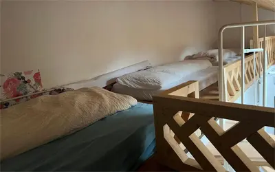 Ein Bett oder Betten in einem Zimmer der Unterkunft Interlaken saberana studio 11