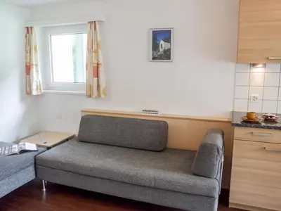 Ein Sitzbereich in der Unterkunft Apartment Amici-4 by Interhome