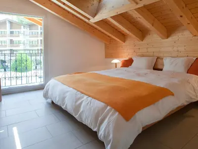 Ein Bett oder Betten in einem Zimmer der Unterkunft Apartment Edelweiss A-1 by Interhome
