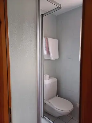 Ein Badezimmer in der Unterkunft Hôtel Garni Les Bouquetins