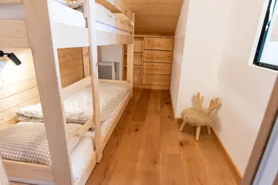 Ein Bett oder Betten in einem Zimmer der Unterkunft Appartement au centre du village à Anzère