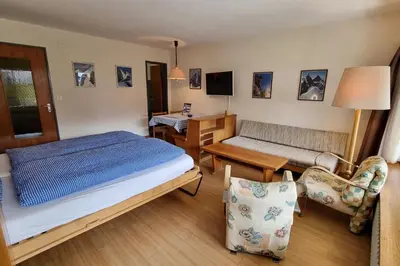Ein Bett oder Betten in einem Zimmer der Unterkunft Haus Matten, Studio Findeln