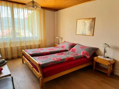 Ein Bett oder Betten in einem Zimmer der Unterkunft Rosenhaus Baccara