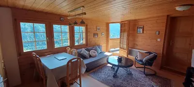 Ein Sitzbereich in der Unterkunft Chalet 3 pièces de caractère