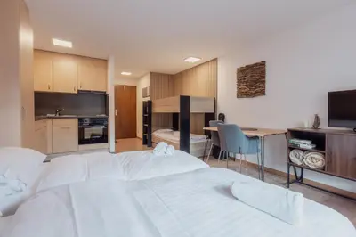 Ein Bett oder Betten in einem Zimmer der Unterkunft Charmant studio au centre de Saas-Fee