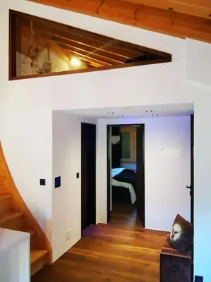 Ein Bett oder Betten in einem Zimmer der Unterkunft Charmante Loft Wohnung in den Bergen