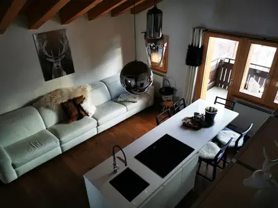 Ein Sitzbereich in der Unterkunft Charmante Loft Wohnung in den Bergen