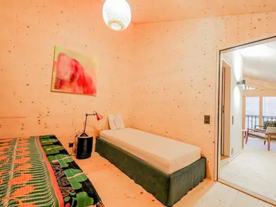 Ein Bett oder Betten in einem Zimmer der Unterkunft Apartment Weisshorn - OG - DG Südwest by Interhome