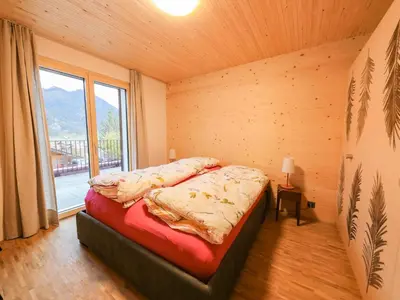 Ein Bett oder Betten in einem Zimmer der Unterkunft Apartment Rinderberg Sockelgeschoss Nordost by Interhome
