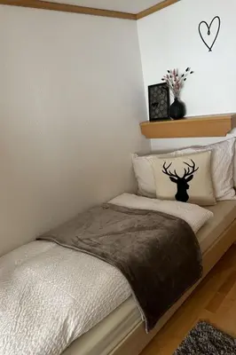 Ein Bett oder Betten in einem Zimmer der Unterkunft Apartment Bergfreude by Interhome