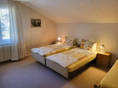 Ein Bett oder Betten in einem Zimmer der Unterkunft Apartment Lilo-4-Zimmer by Interhome