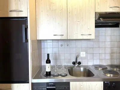 Küche/Küchenzeile in der Unterkunft Apartment Konkordia 1 EG Süd by Interhome