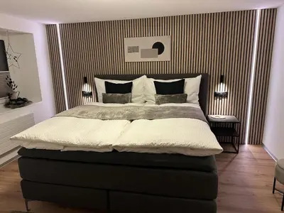 Ein Bett oder Betten in einem Zimmer der Unterkunft Apartment Enzian by Interhome