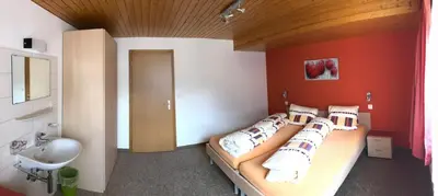 Ein Bett oder Betten in einem Zimmer der Unterkunft Ferienhaus Perle