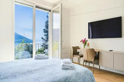 Ein Bett oder Betten in einem Zimmer der Unterkunft Lake Music