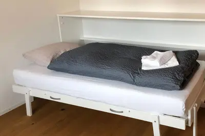 Ein Bett oder Betten in einem Zimmer der Unterkunft Haus Birke - Alpenglück