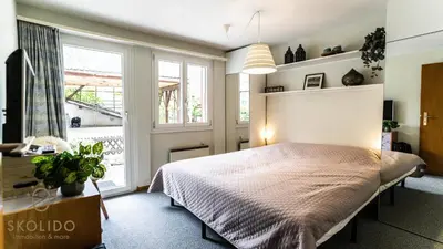 Ein Bett oder Betten in einem Zimmer der Unterkunft Chalet Tannen Hüsli, Breiten