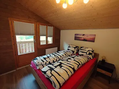 Ein Bett oder Betten in einem Zimmer der Unterkunft Haus Zur Mühle
