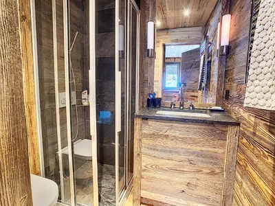 Ein Badezimmer in der Unterkunft Crans-Montana Luxe & Charme Appartement - Ski in & Out