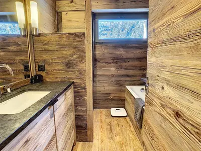 Ein Badezimmer in der Unterkunft Crans-Montana Luxe & Charme Appartement - Ski in & Out