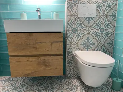 Ein Badezimmer in der Unterkunft Ferienwohnung Alpen-Zauber Leukerbad
