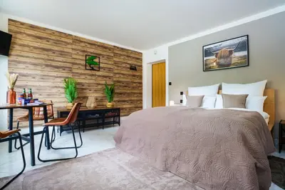 Ein Bett oder Betten in einem Zimmer der Unterkunft Helles, Chalet-Stil Apartment mit Allalinblick
