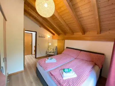 Ein Bett oder Betten in einem Zimmer der Unterkunft 'DAHElM'