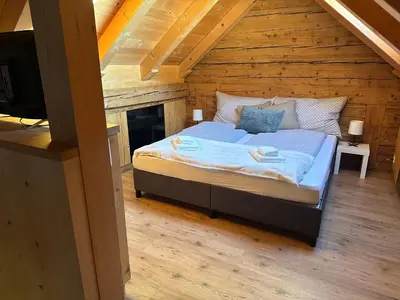 Ein Bett oder Betten in einem Zimmer der Unterkunft Ferienwohnung Klou