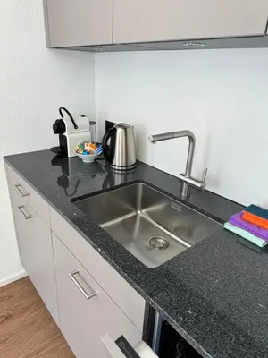Küche/Küchenzeile in der Unterkunft Heimatli - moderne Ferienwohnung im Sörenberg