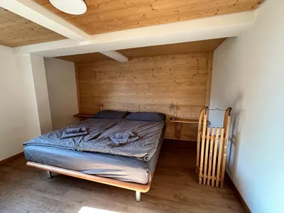 Ein Bett oder Betten in einem Zimmer der Unterkunft Chalet Luegistal