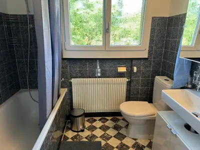 Ein Badezimmer in der Unterkunft See und Berge Loft